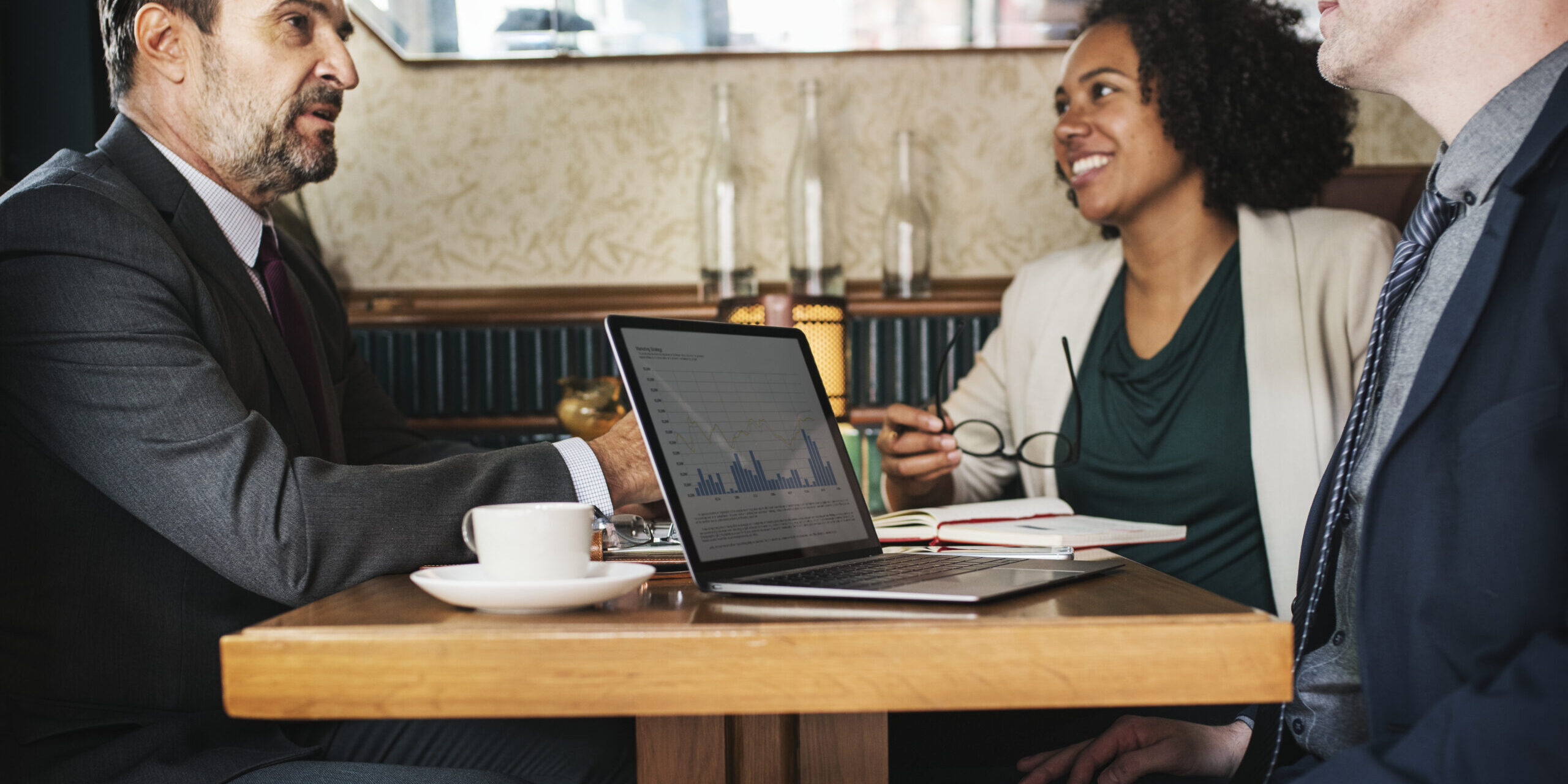 Business meeting at a cafe Law Firm Marketing