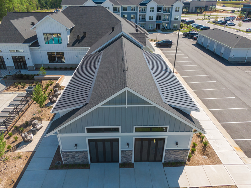 Aerial view of completed roofing project in multi-home community.