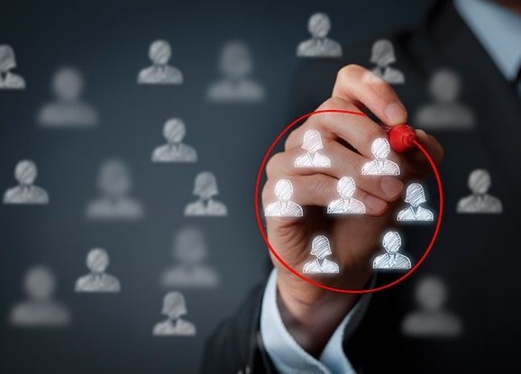person circling a target group