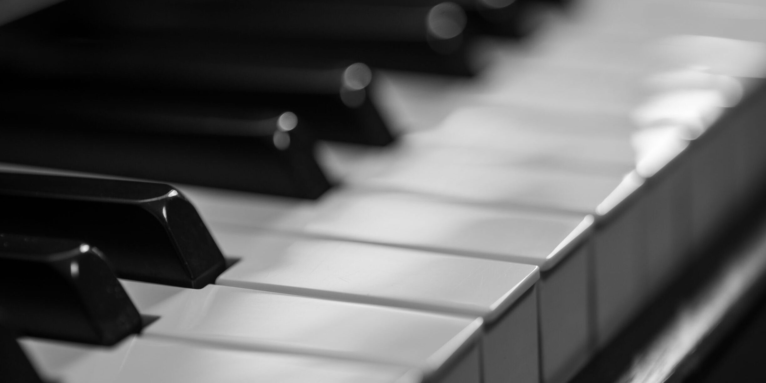 Jazz,Piano,Keys.,Close-up,Of,Piano,Keys,,Focused,On,One