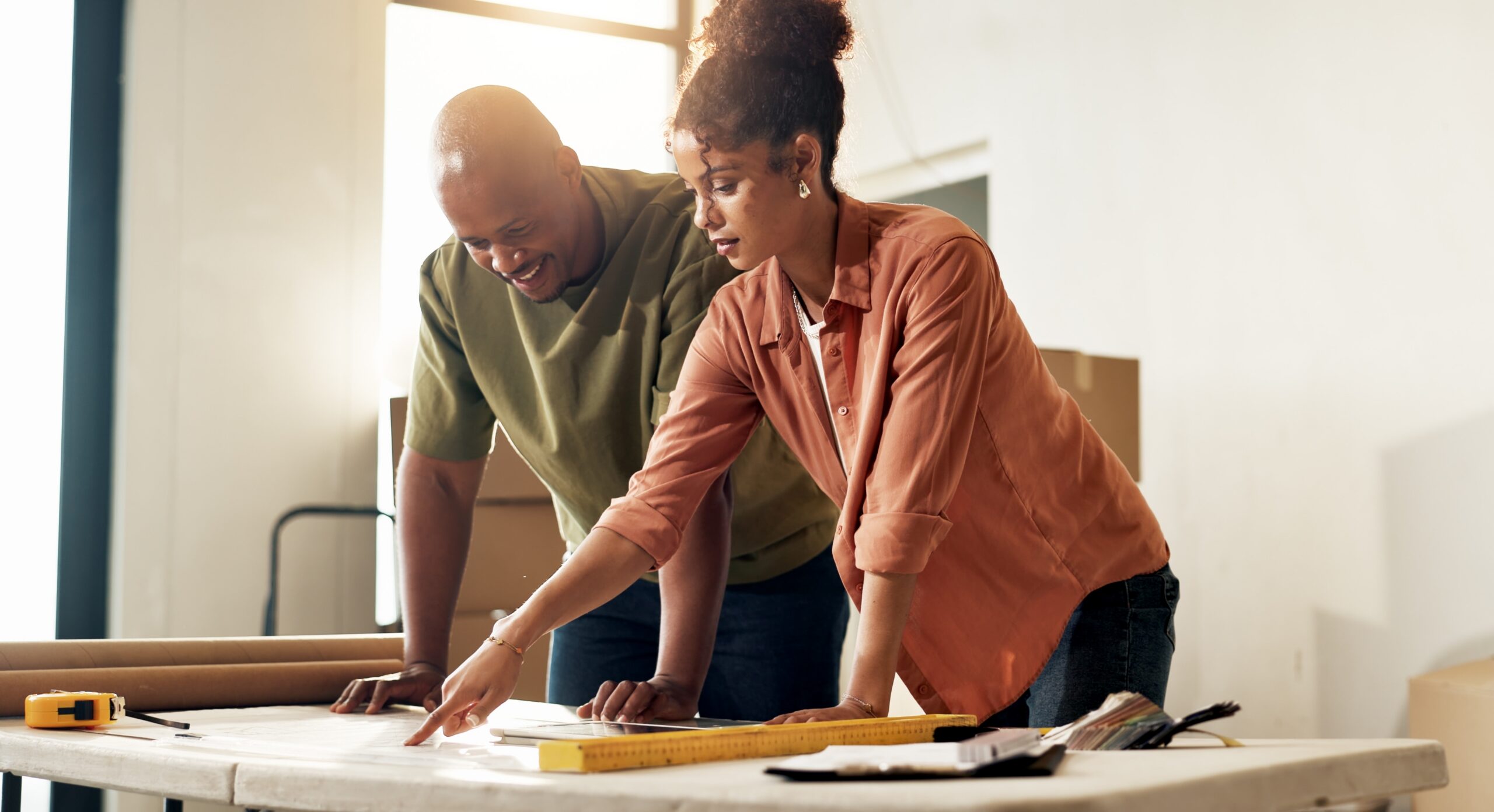 Company heads reviewing remodeling services for clients, looking for a ppc remodeling agency