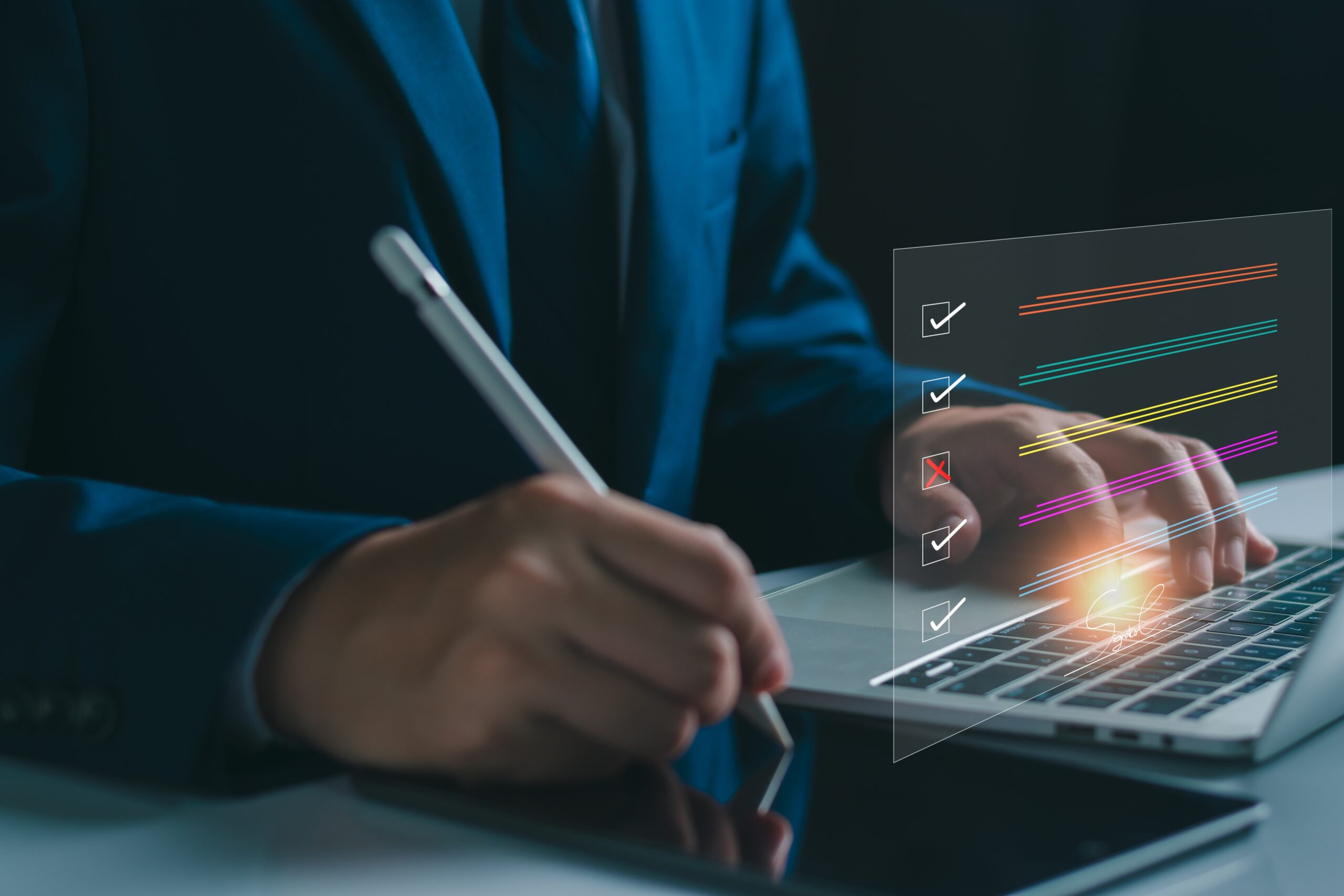 A man on a laptop tick marking his checklist for google ads and LSA migration